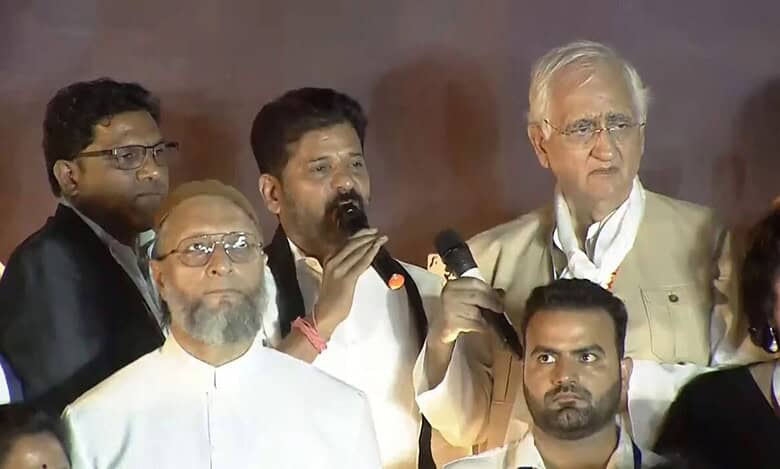 The image shows CM Revanth Reddy, Congress senior leader Salman Khurshid and AIMIM chief Asaduddin Owaisi at a candle-light rally held on the Necklace Road against Pahalgam terror attack on April 25, 2025.