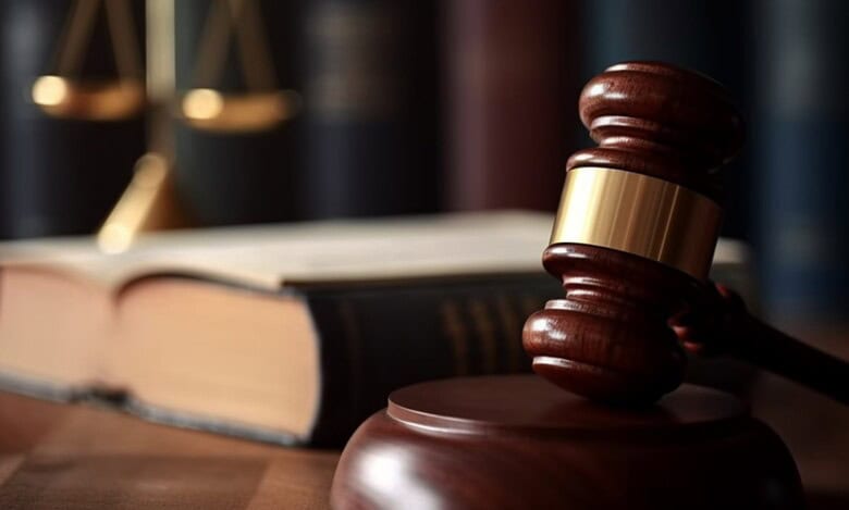 Representational Image of gravel and law books