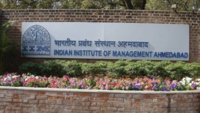 Photo of the front entrance signage of the Indian Institute of Management Ahmedabad (IIM Ahmedabad).