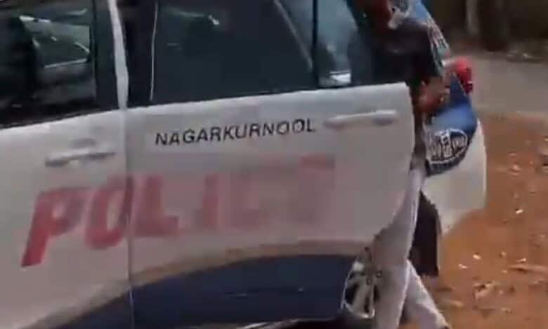 Nagarkurnool police car being used to create a reel.
