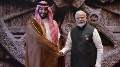 Indian Prime Minister Narendra Modi with Saudi Arabia's Crown Prince and Prime Minister Mohammed bin Salman.