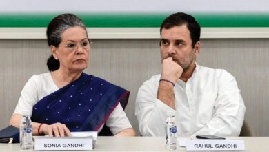 Sonia Gandhi and Rahul Gandhi in conversation at Congress meet.