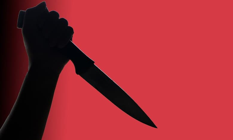 Representational Image of man holding a knife