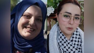 Side-by-side photo of Turkish influencer Turkan Atay wearing a blue hijab, smiling warmly, and Pakistani fashion designer Maria B wearing glasses and a black-and-white keffiyeh scarf, posing indoors.