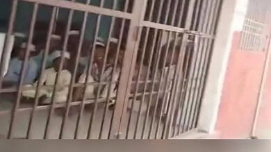 The image shows 32 Muslim children detained in Bihar for wearing skull caps in April 2025