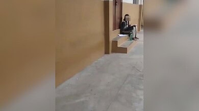 The image shows a student whose face is blurred sitting outside a class dated April 10, 2025