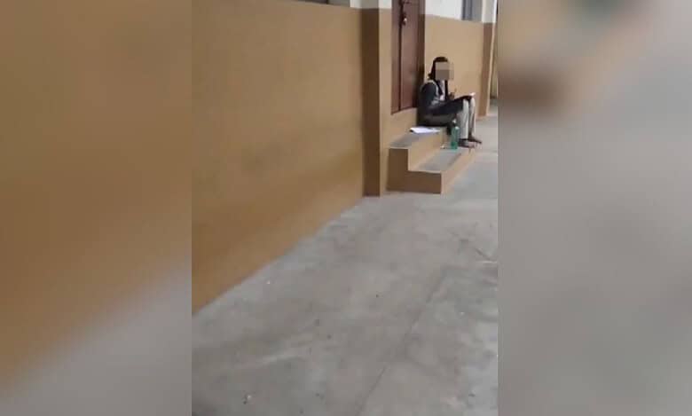 The image shows a student whose face is blurred sitting outside a class dated April 10, 2025