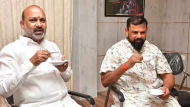 The image displays BJP leaders Bandi Sanjay and T Raja Singh having a cup of tea. April 12, 2025