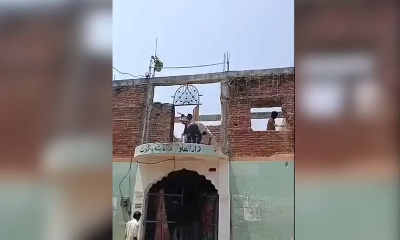 The image displays the demolition of madarsa in Madhya Pradesh. April 13, 2025