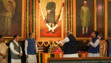 The image displays Congress president Mallikarjun Kharge paying his tributes on the occasion of Dr BR Ambedkar birth anniversary in New Delhi on Monday. April 14, 2025
