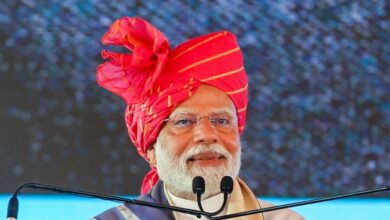 The image displays a picture of Prime Minister Narendra Modi, April 14, 2025