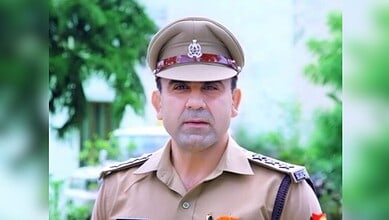 The image displays a picture of Sambhal circle inspector Anuj Choudhary. April 19, 2025