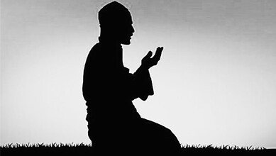 The image displays a representational image of a Muslim man