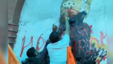 The image displays right-wing workers defacing a mural of Bahadur Shah Zafar, mistaking it to be Aurangzeb in Ghaziabad railway station
