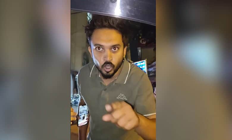 The image displays a North Indian man arguing with a Kannada speaking auto driver to speak in Hindi