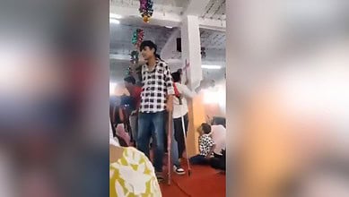 The image displays members of Bajrang Dal and VHP wielding sticks during Easter celebration in a church in Ahmedabad. April 21, 2025