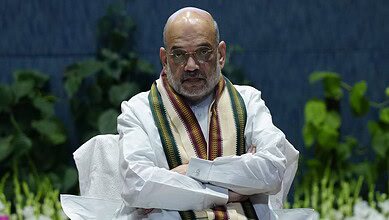 The image displays a picture of Union Home Minister Amit Shah