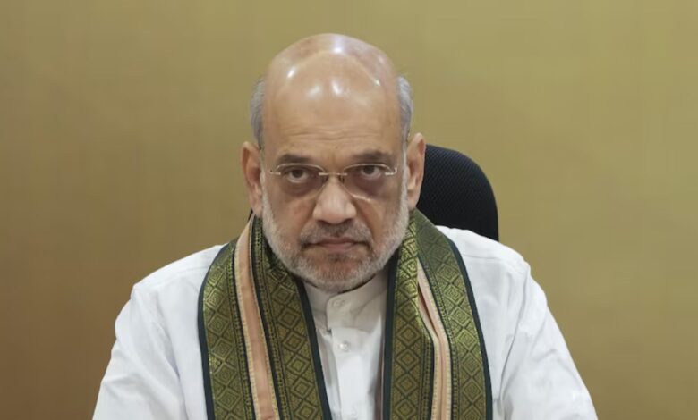 The image displays a picture of Union Home Minister Amit Shah