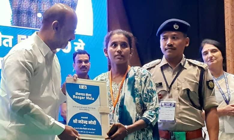 The image displays a picture of Bandi Sanjay giving away joining letters to new recruits at the Rozgar Mela in Hyderabad
