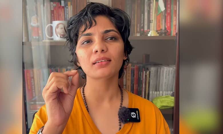 The image displays a picture of folk singer Neha Singh Rathore