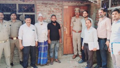 The image displays a picture of district magistrate of Shravasti along with police official after demolishing "illegally operated and unrecognised madrasas."