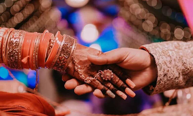 Representational photo of a couple getting married.