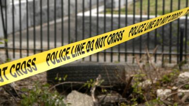 Yellow police tape reading 'Police Line Do Not Cross' at an accident scene - represents investigation into fatal hit-and-run involving Indian student in US.