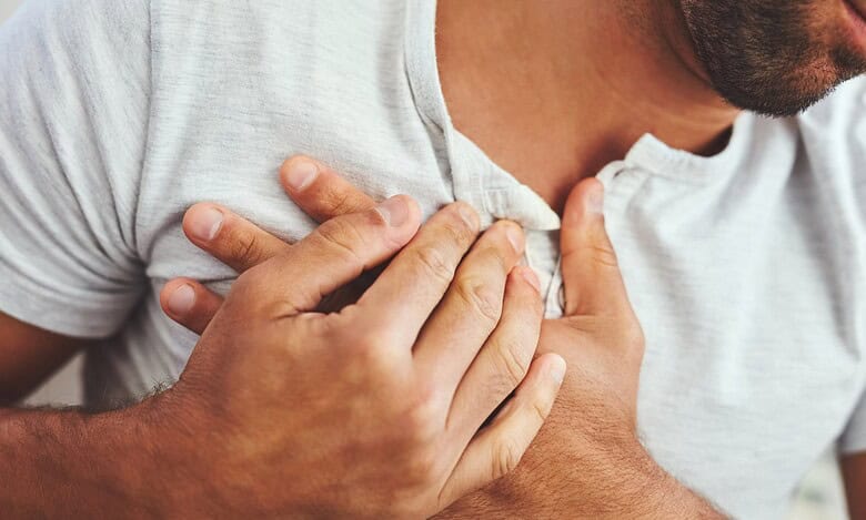 A Representational Image of man holding his heart