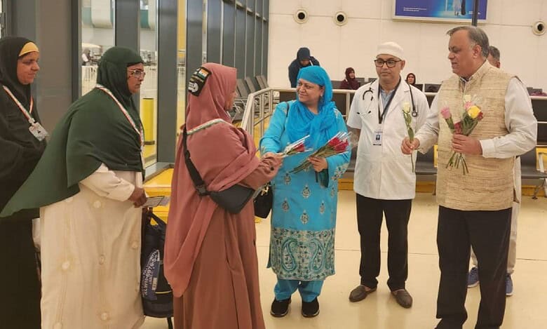 Photo of all-women Haj pilgrims from Kerala gather in the Haj Terminal, greeted by India's Ambassador Dr. Suhel Khan and his wife.
