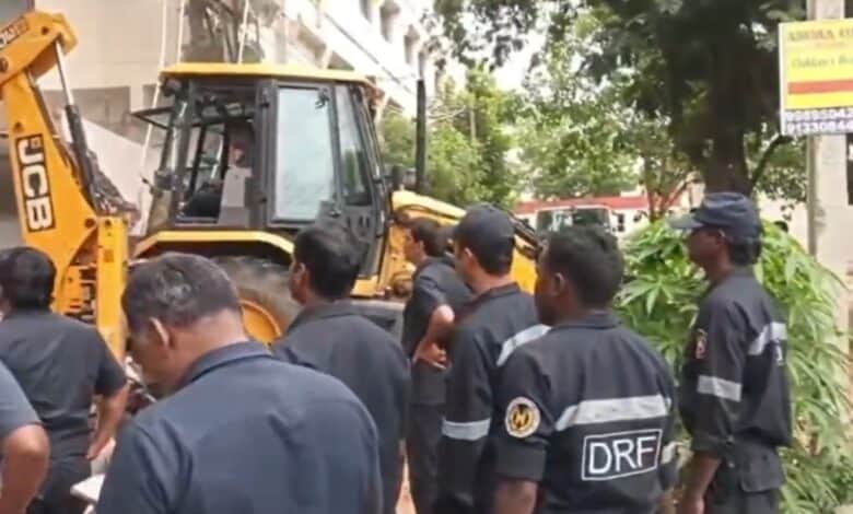 HYDRAA officials clearing illegal road encroachments in a residential area of Hyderabad after receiving complaints from local residents.