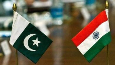 Flags of Pakistan and India placed side by side during bilateral peace talks, symbolising the recent ceasefire agreement.