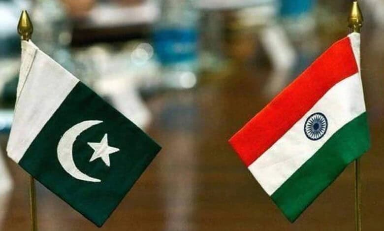 Flags of Pakistan and India placed side by side during bilateral peace talks, symbolising the recent ceasefire agreement.