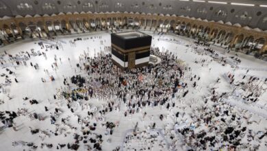 Pilgrims gather around the Holy Kaaba in Masjid al-Haram, Makkah, with the Kiswah partially raised and covered with a white cloth during the 1446 AH–2025 Hajj season as a precautionary measure.