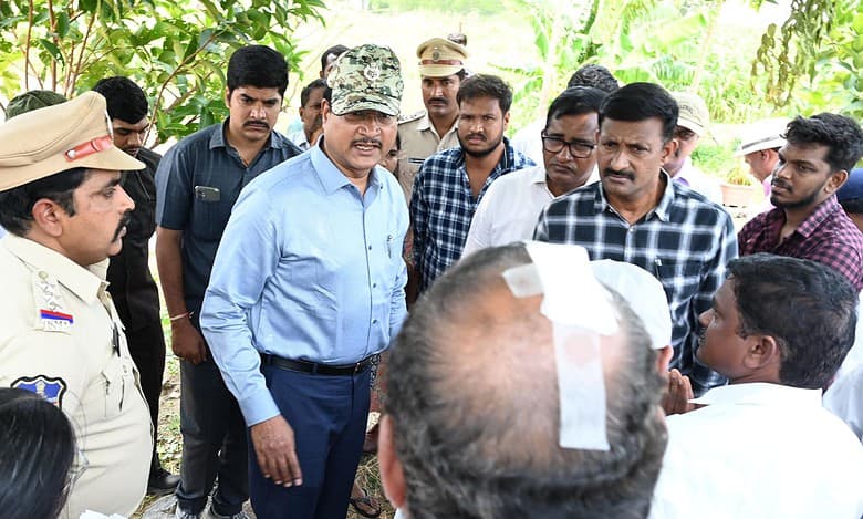 The image shows the victims of land grabbing in Koheda village, speaking with HYDRAA commissioner AV Ranganath on Wednesday, May 14, 2025.