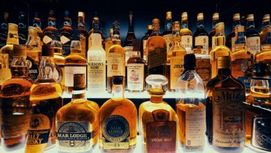 A number of liquor bottles lined up for liquor in Hyderabad copy