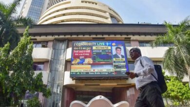Mumbai: A man walks past the Bombay Stock Exchange (BSE) building, in Mumbai, Tuesday, Dec. 5, 2023. Sensex on Tuesday jumped 169.94 points to fresh peak of 69,035.06 in early trade; Nifty climbed 52.60 points to hit record high of 20,739.40. (PTI Photo)