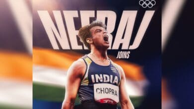 Athlete Neeraj Chopra in an Indian uniform, celebrating with the text "NEERAJ JOINS INDIA THE 90M LEAGUE" and the Olympic logo, against the Indian flag backdrop.
