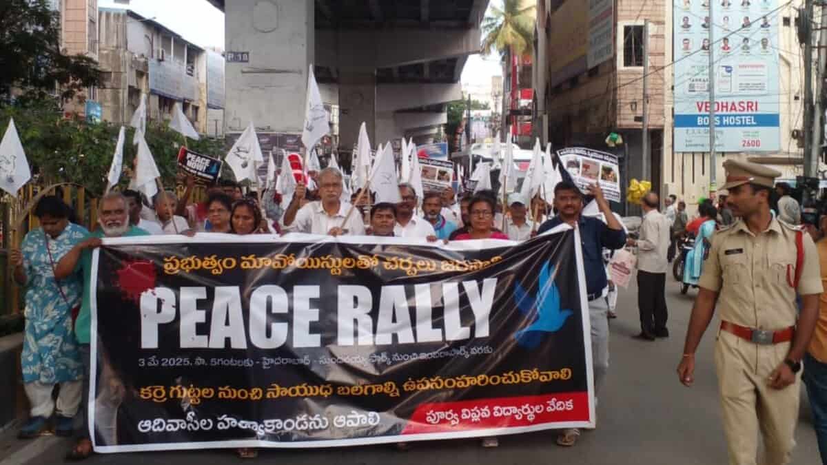 The image shows civil society organisations holding a peace rally demanding an end to 'Operation Kagaar' by the Centre in Adivasi areas, on Saturday, May 3.