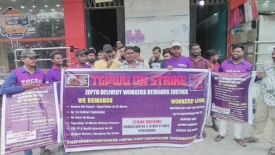 Photo of Zepto workers protesting in Hyderabad, holding placards with their demands