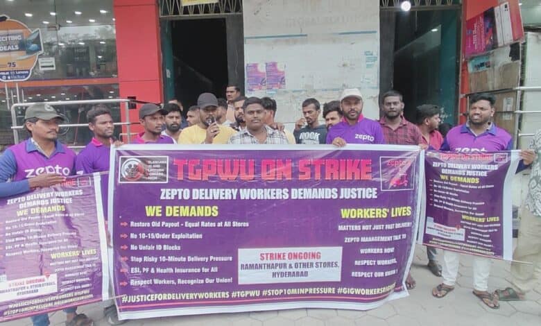 Photo of Zepto workers protesting in Hyderabad, holding placards with their demands