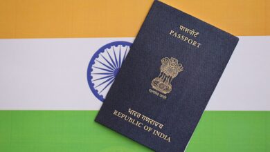 Representational image of an Indian passport with the national flag in the background.