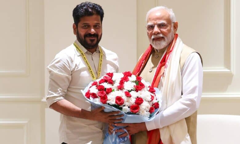 The image shows Telangana CM Revanth Reddy meeting PM Narendra Modi in Delhi on May 24, 2025.