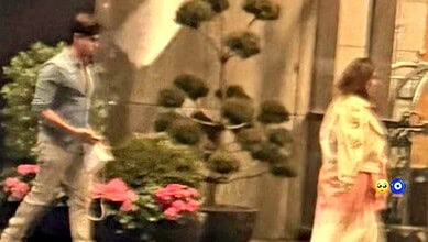 Sidharth Malhotra holding Kiara's bag