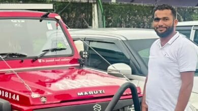 The image displays a picture of man with a red jeep