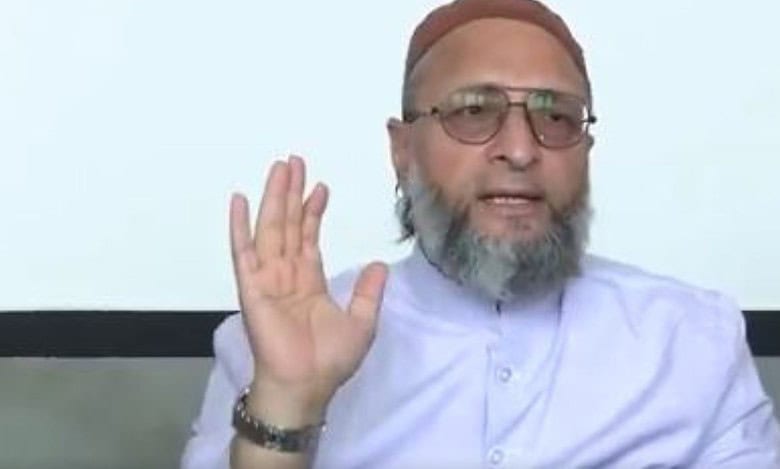 The image displays a picture of AIMIM leader Asaduddin Owaisi addressing a press conference at Darussalam