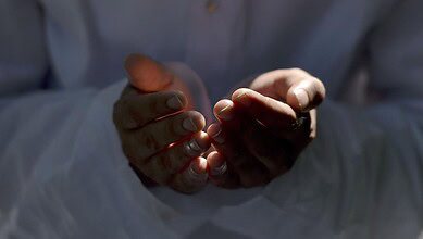 The image displays a representational picture of namaz