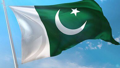 The image displays a picture of a Pakistani national flag