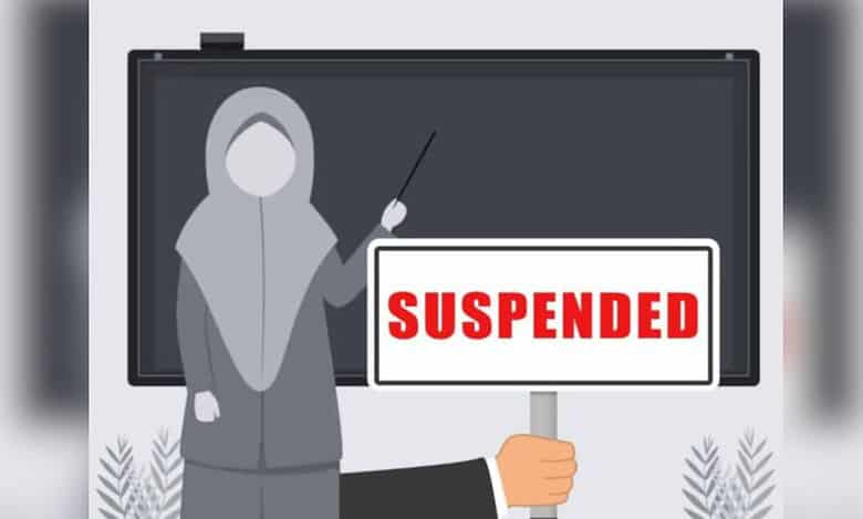 The image shows a picture of Muslim teacher suspended