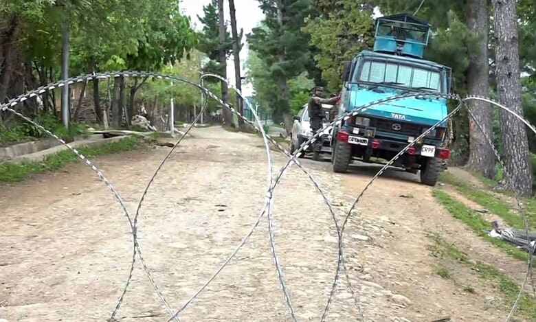 The image displays a scene from an encounter between LeT terrorists and Indian Army in Shopian