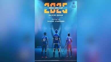 The image displays a picture of a poster of Hockey Asia Cup